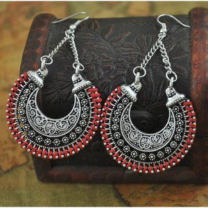 Bohemian vintage earrings hollow carved meniscus flower basket earrings......